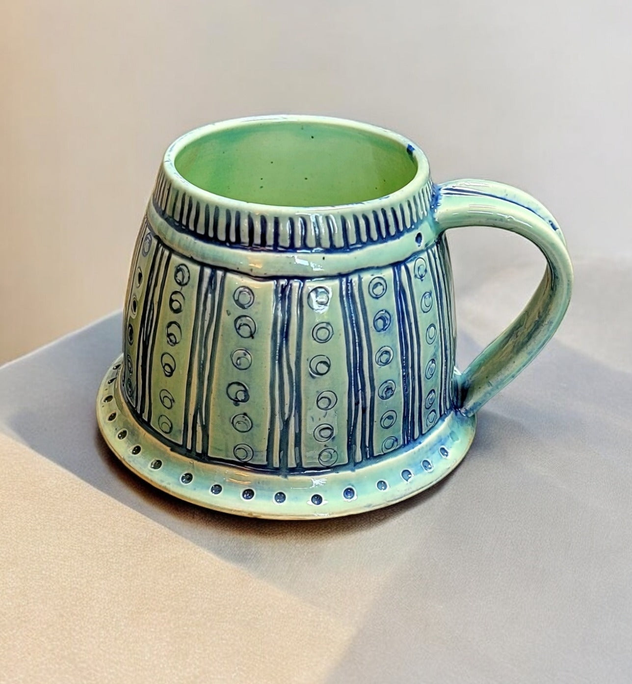 Large Porcelain Pale Celadon Mug with Carved Designs