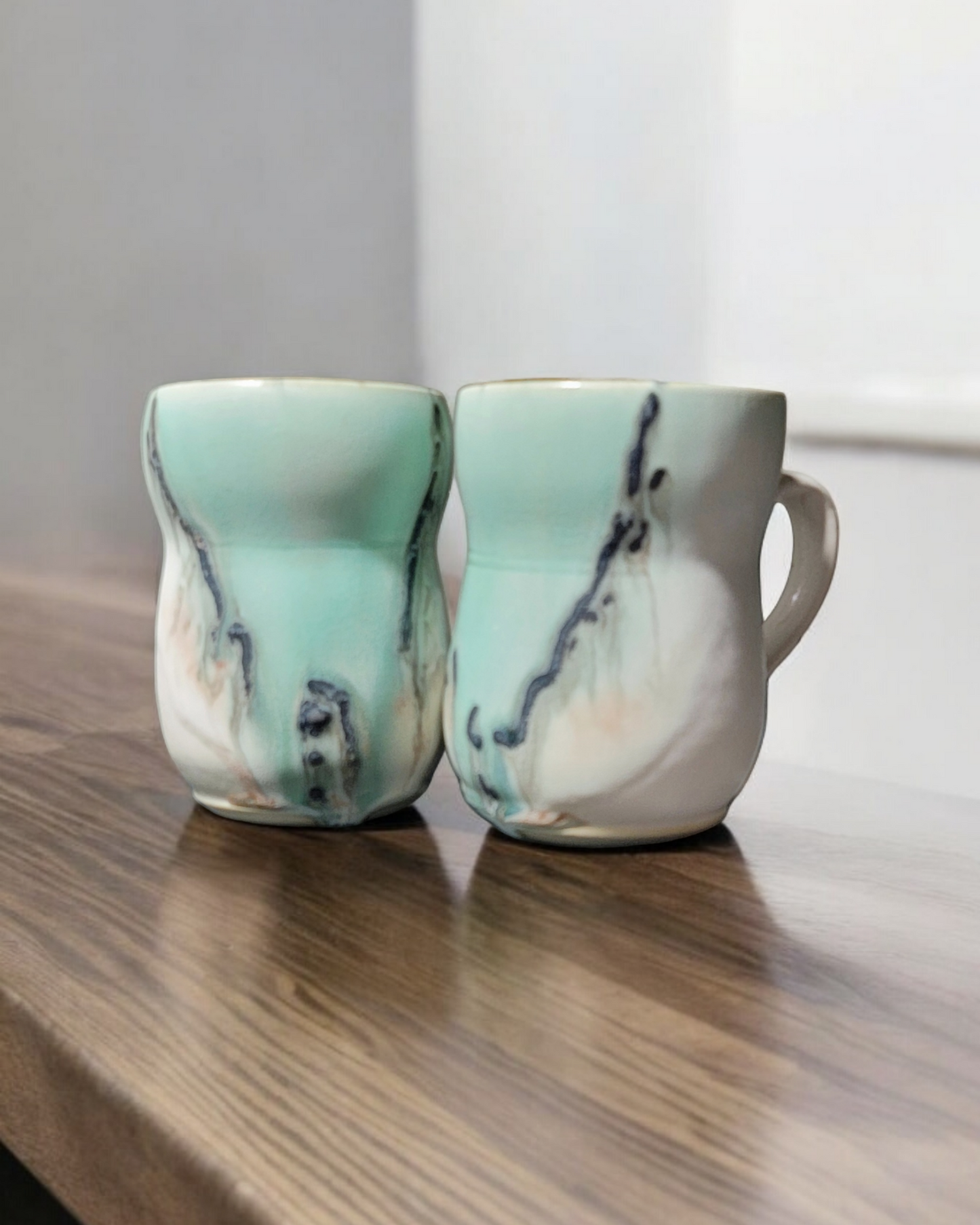 White and Pale Mint Cups with Abstract Lines