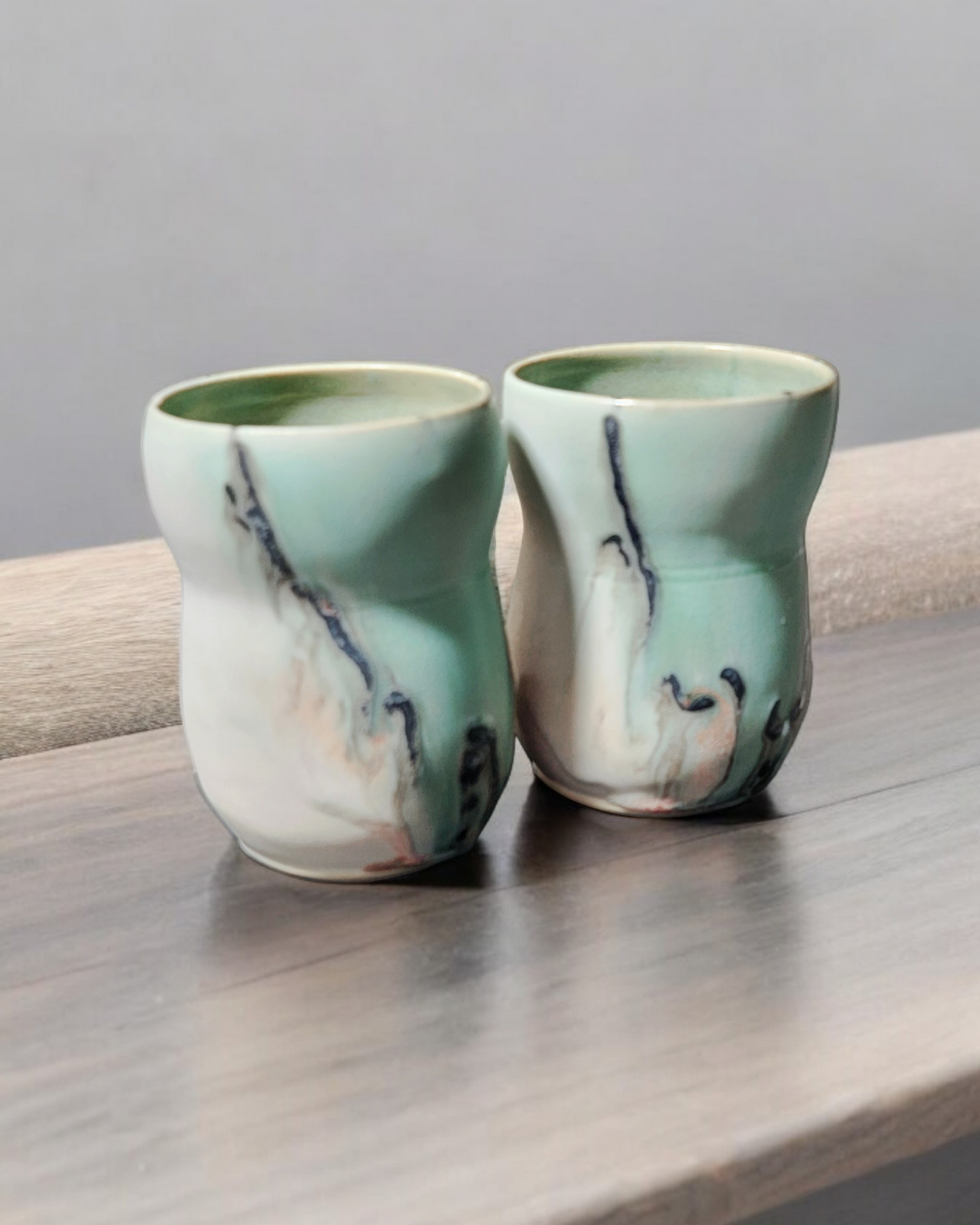 White and Pale Mint Cups with Abstract Lines